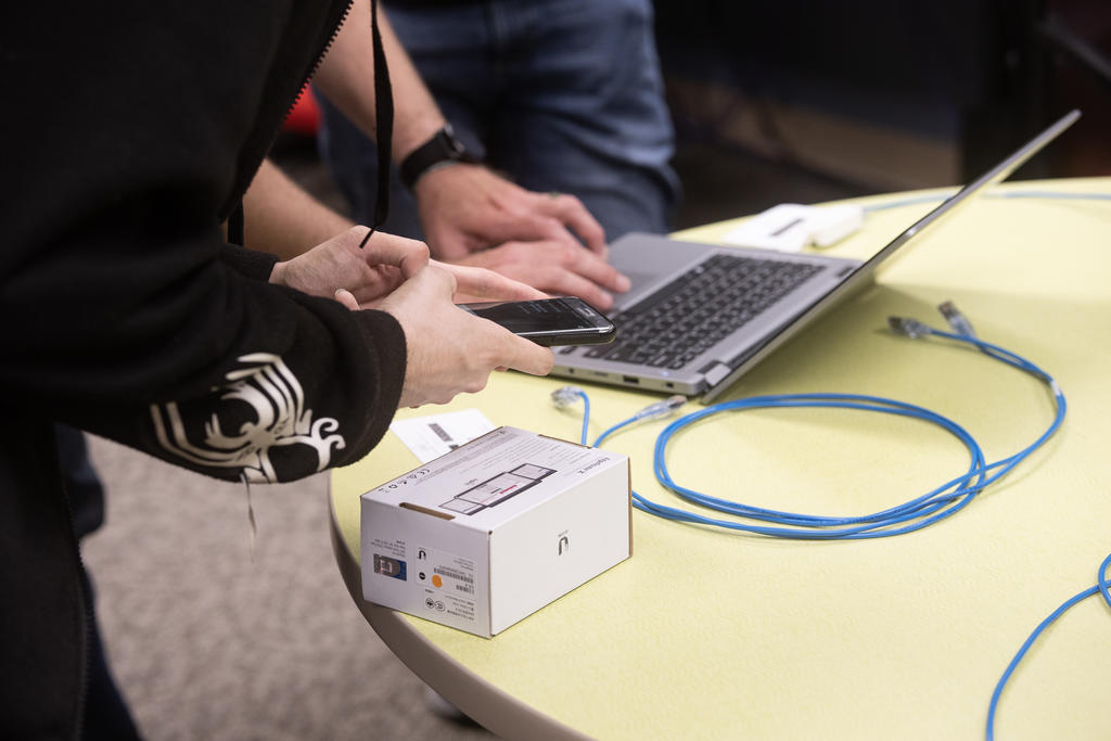 Cyber security student working with ethernet connection