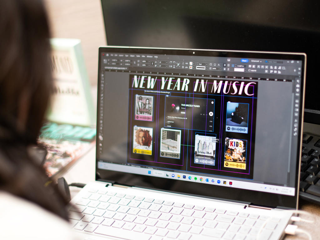 Journalism student laying out magazine design