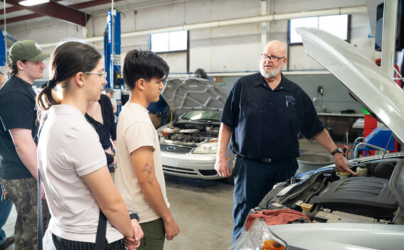 Automotive instructor teaching students