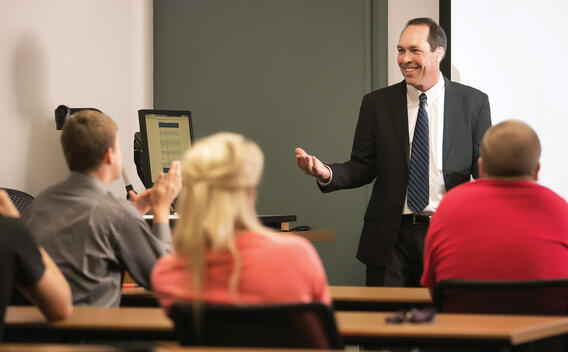 Marketing students in class with professor